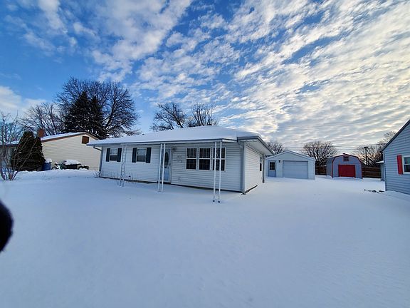 Front of house and 1.5 car garage