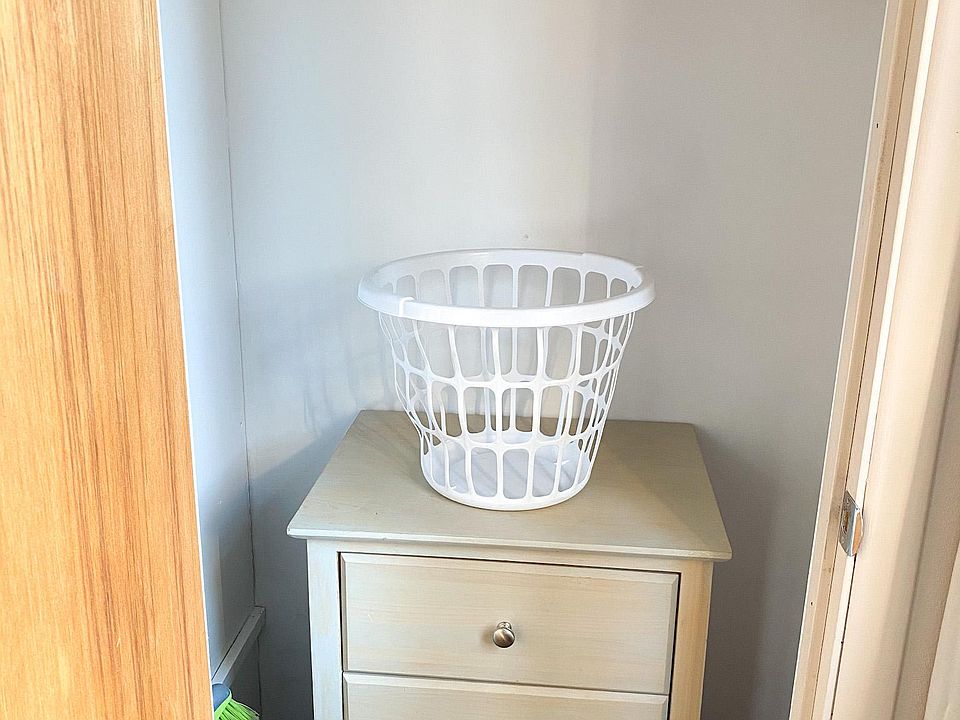 Closet has room for this mini dresser, and has shelves above for out of season clothes.