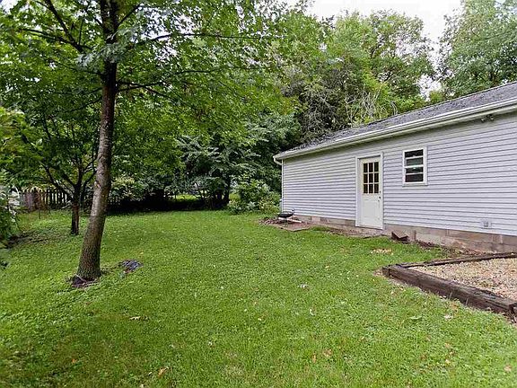 Partially fenced backyard. Great for kids.