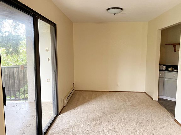 Dining Area (new carpet and paint) with outdoor patio