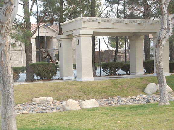 Tennis Court and Grass Area