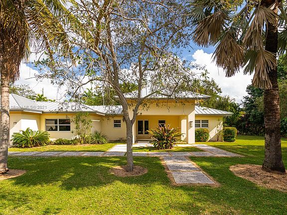 Very nice walkway leading to the front door from the street as well as the driveway in front of the garage. By the way the electrical and foundation for an electric gate are on both sides of the driveway.