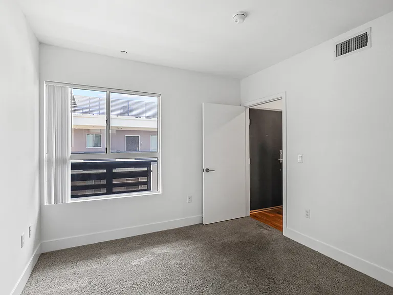 Bedroom with Courtyard Facing Window