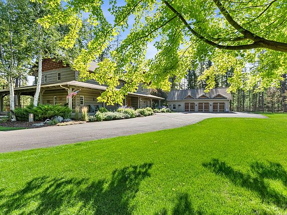 The driveway approach to house and garage.