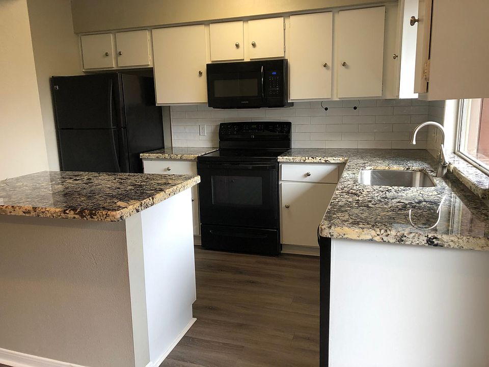 Kitchen with granite counters & very large pantry