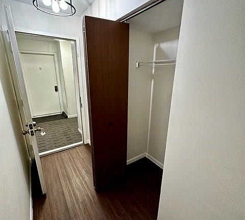 Front door to common hallway and entry closet