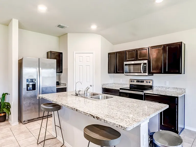 6107 Sally Ride Ln — Photo 13