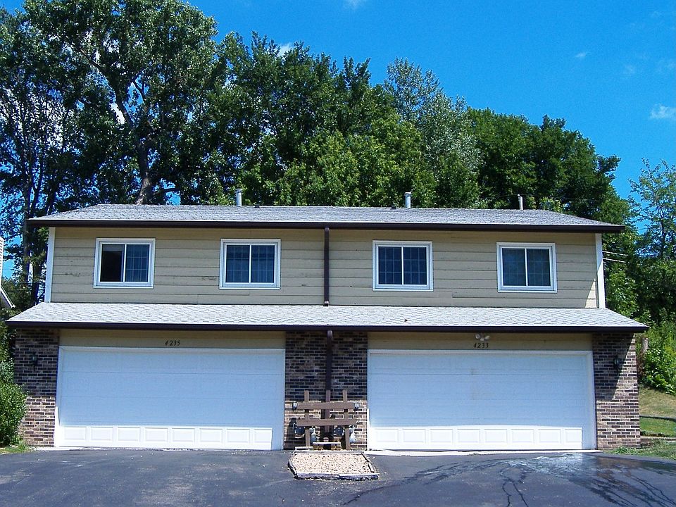 Front Each side has own two car garage.
