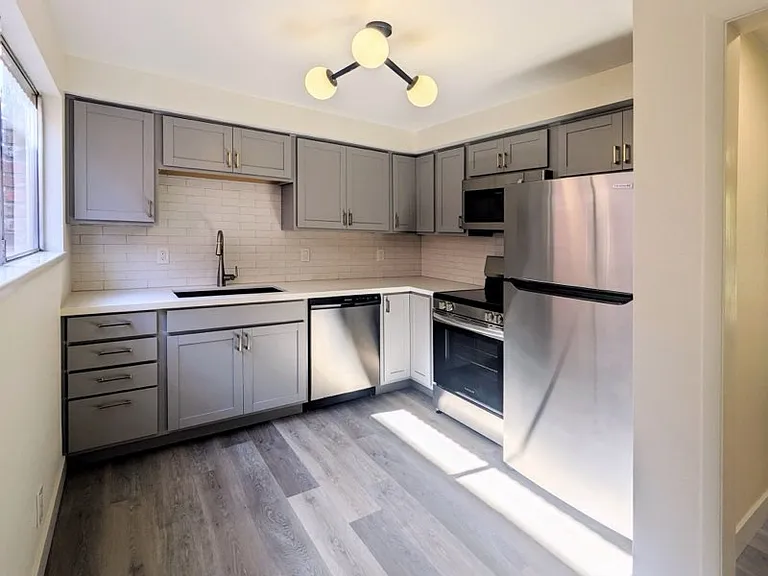 Beautiful Kitchen Featuring All New Frigidaire Stainless Steel Appliances, New Cabinets and Counter Tops