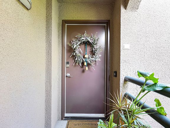 Outside entrance with ring security system.
