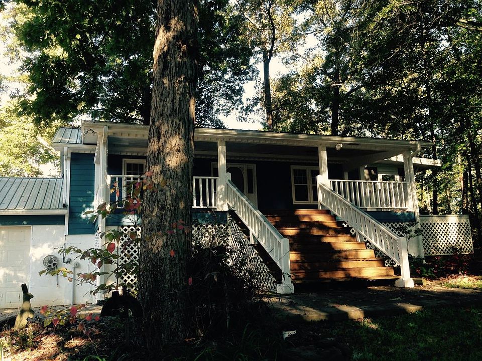 Exterior view looking at house from lake