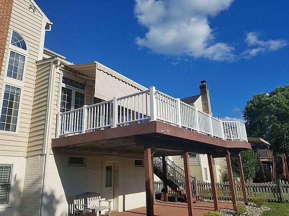 Brick patio,width of house