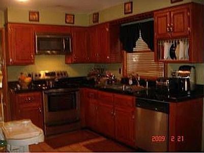 fully rennovated kitchen overlooking indoor swimming pool