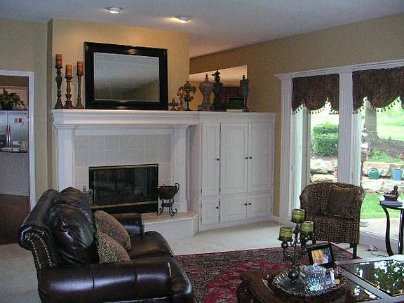 Fireplace - See thru from kitchen/hearth room and family room