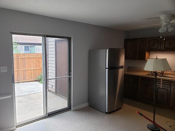 Kitchen with small private patio; outside storage shed