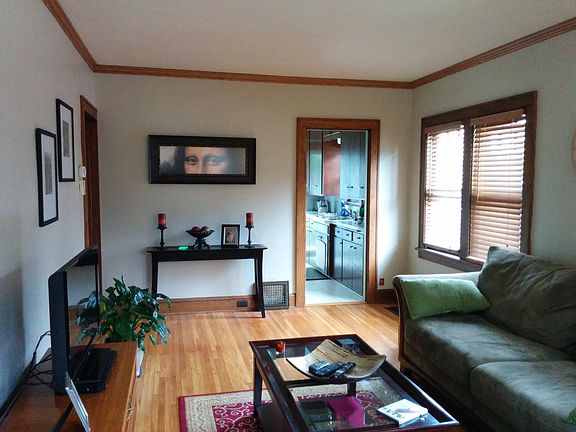 Enter the main floor and living room from the front porch.