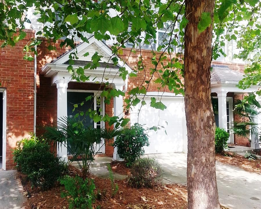 Please note, the tree in front of the townhouse is no longer