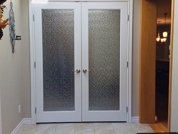 Custom foyer doors/skylight