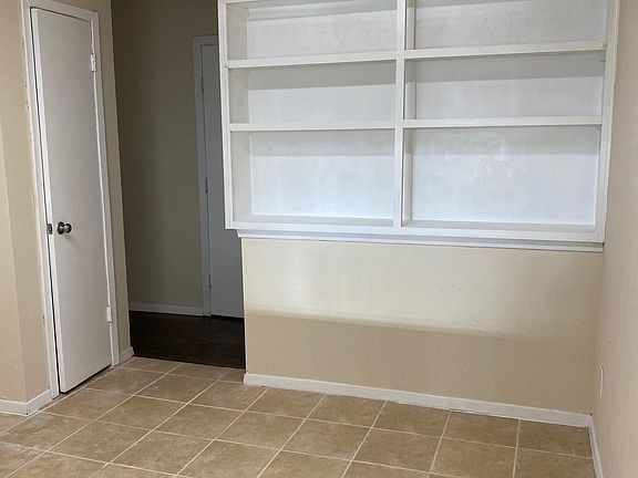 Alternate view of cabinetry in the kitchen. Large enough for a breakfast table.
