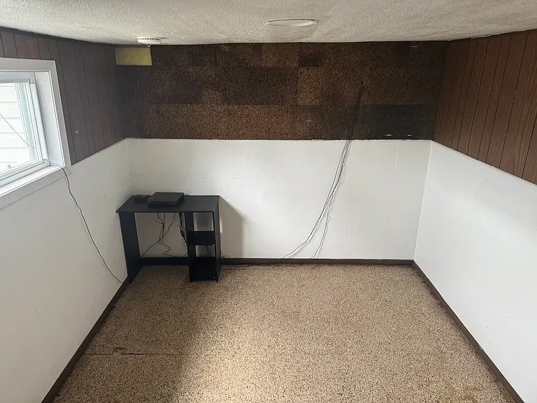 extra storage area, or small office located off of the laundry room