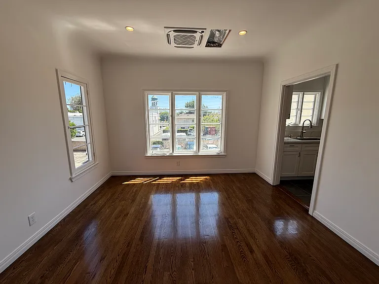 Large Living Room and Dining Area with direct access to Kitchen