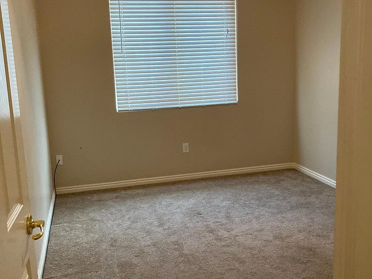 Bedroom facing the back of house.