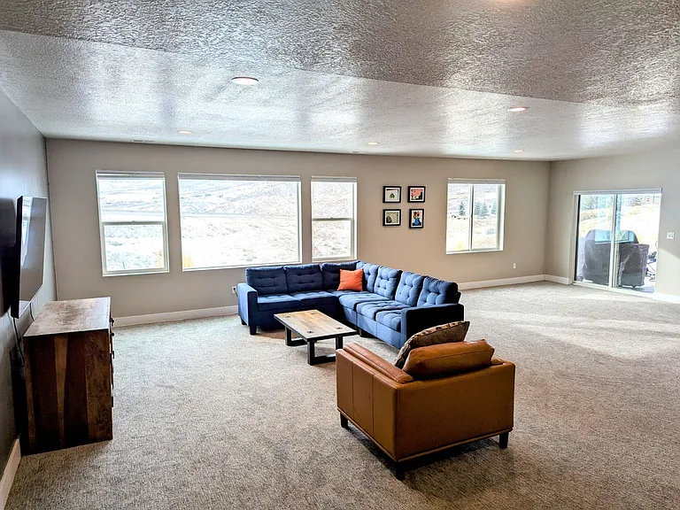 Lower level, walk out to backyard, grill area and Bullfrog hot tub.