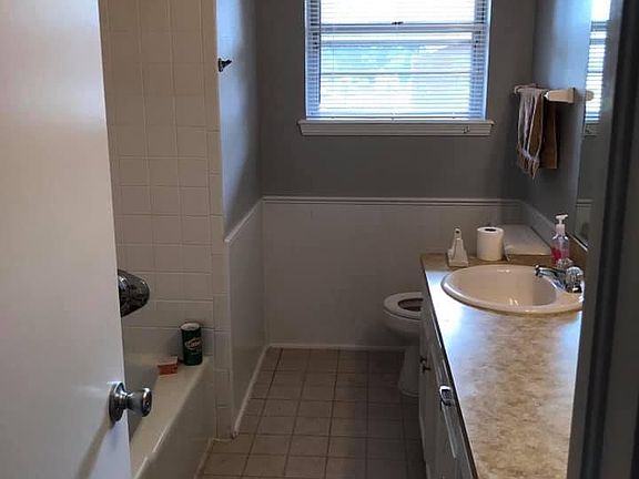 Hall bath with new countertops and freshly painted.