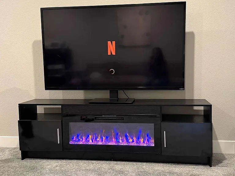 Private electric fireplace with storage