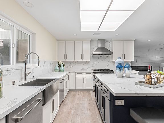 Double dishwasher and high-end refrigerator included.