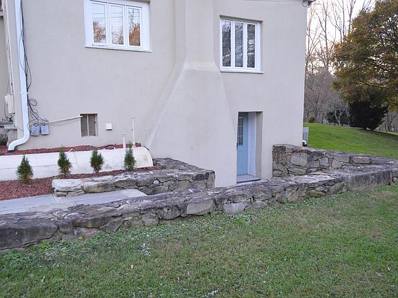 Patio leading to entrance.
