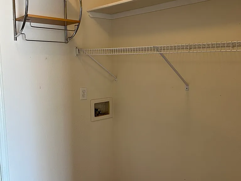 Utility room, right off garage and kitchen, with washer/dryer hookups only (tenant must supply washer and dryer).