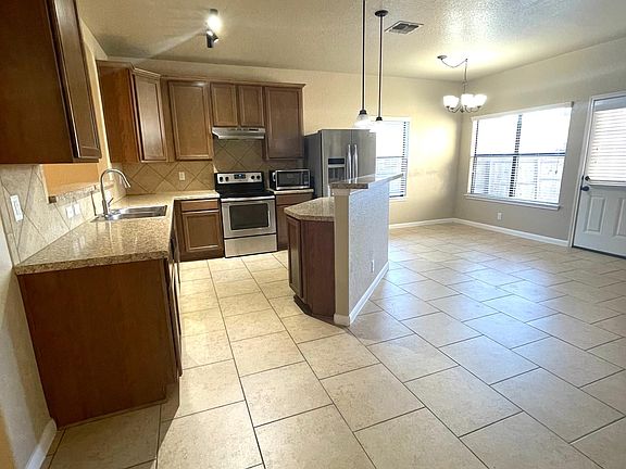 4th image of 5977 Midcrown Dr