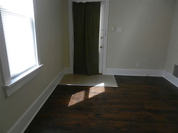 living room - new floors, new paint, new window, new screen