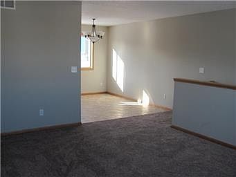 good sized dining area that opens to the living room and dra