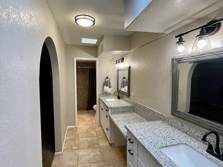 Primary bathroom with double vanities