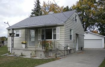 Neat & clean 2 bedroom home in Portsmouth Twp. 1st floor just freshly painted & newer carpeting. 1st floor laundry also has step in shower. Lots of recent updates include vinyl windows, hot water tank, furnace & ca. Roof 2 yrs old & electric service in 2012. Plaster walls. Full basement. Large 2 car detached garage with opener. Immediate Occupancy. Just a nice solid home for the money!