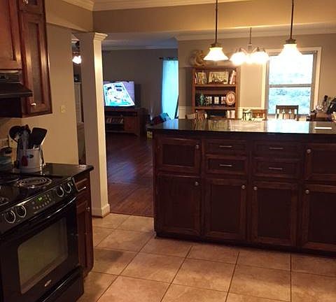 Renovated kitchen with granite counter tops