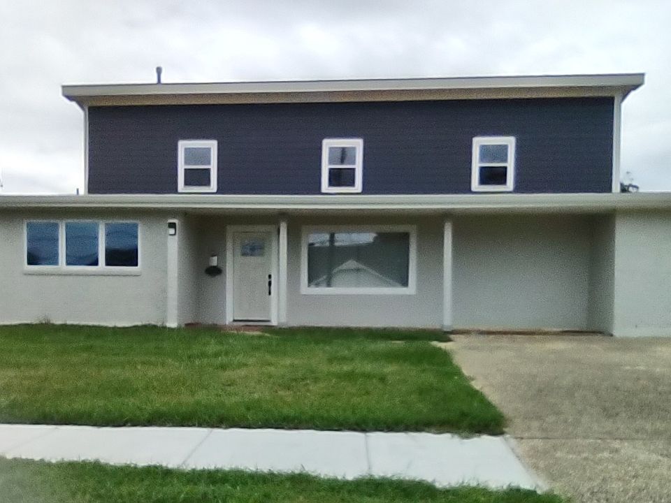 5904 Camphor Street, front of house with double driveway