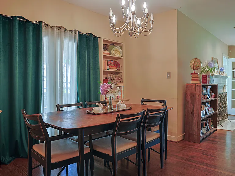 The glass doors in the dining room open out onto a screened porch, which connects to the sunroom through an additional exterior glass door. When all doors are open in the Spring and Fall it sends the most wonderful breezes throughout the house!