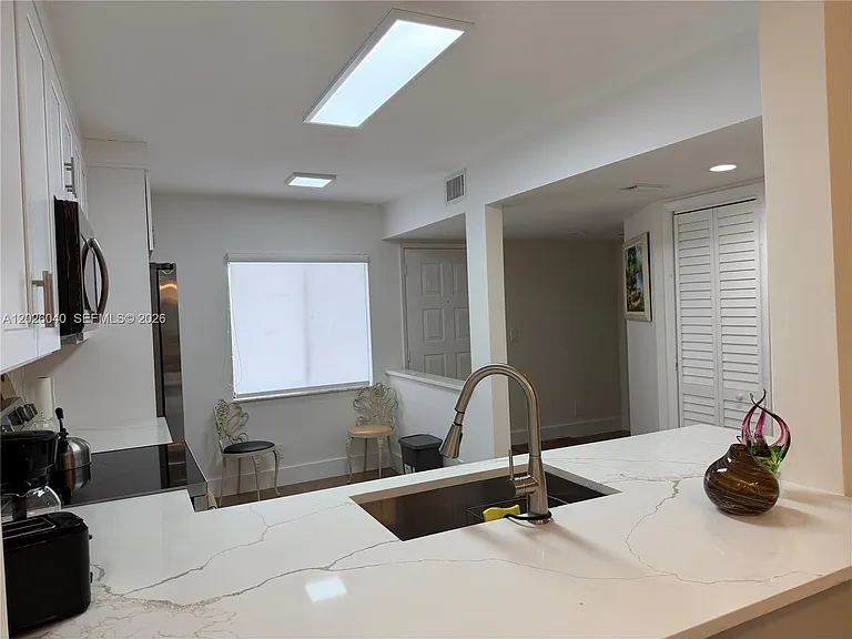 7350 Kinghurst Dr #305 — Photo 17