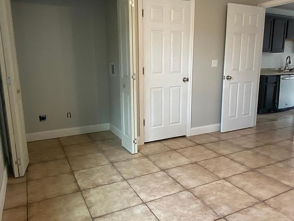 laundry closet with electric dryer & washer hook-ups
