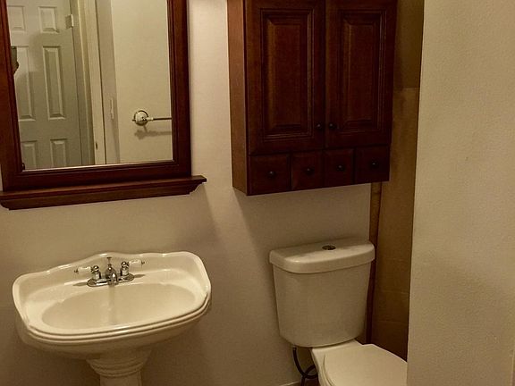Full bathroom in hall.