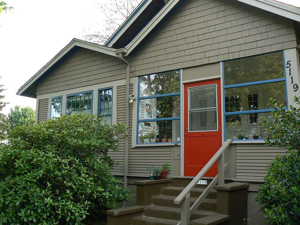 Entrance through enclosed front porch