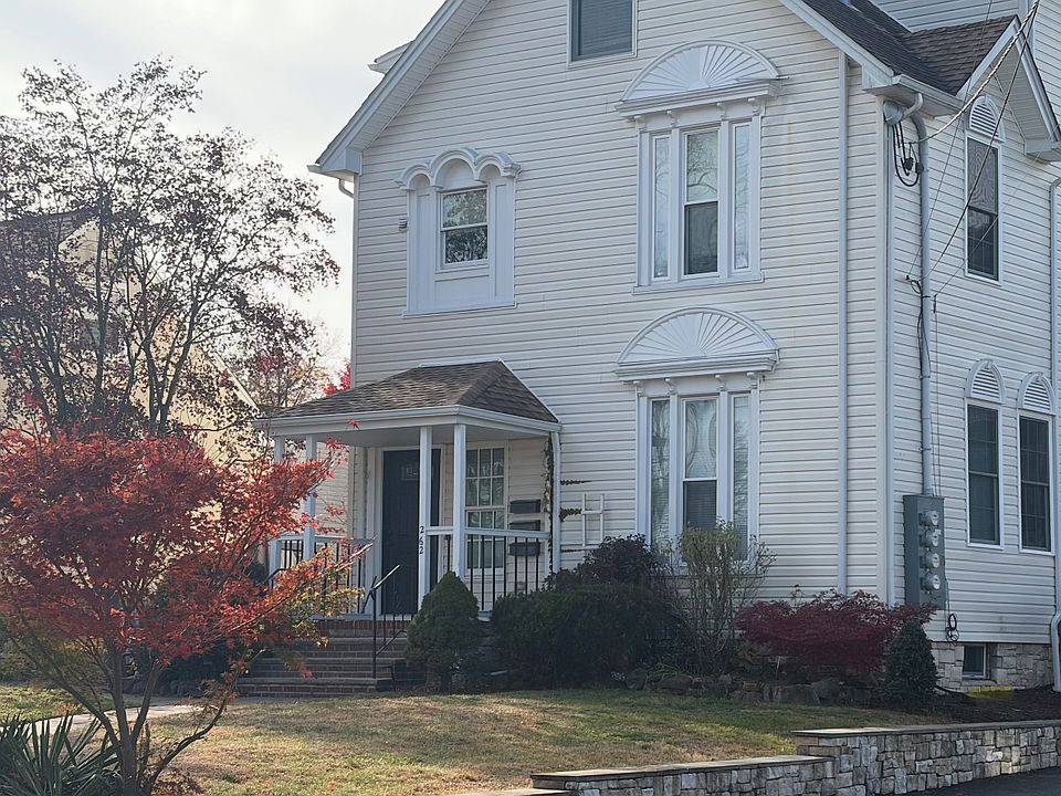 View from street - Unit 3's private entrance is at back of house.