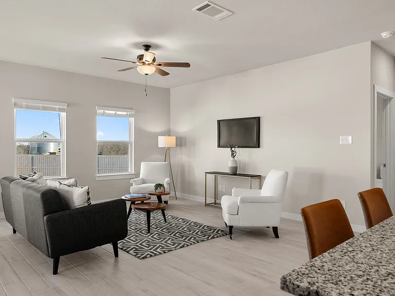 Living space is flexible for various furniture arrangements.
