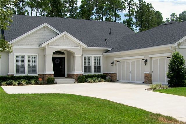 Great entry with 3-car courtyard garage