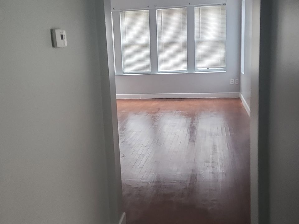 Hallway to living room view from entry door