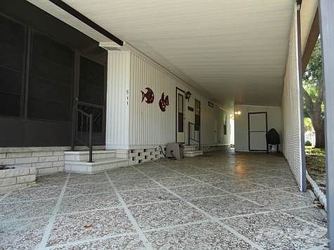 LONG CARPORT PARKS 2 CARS