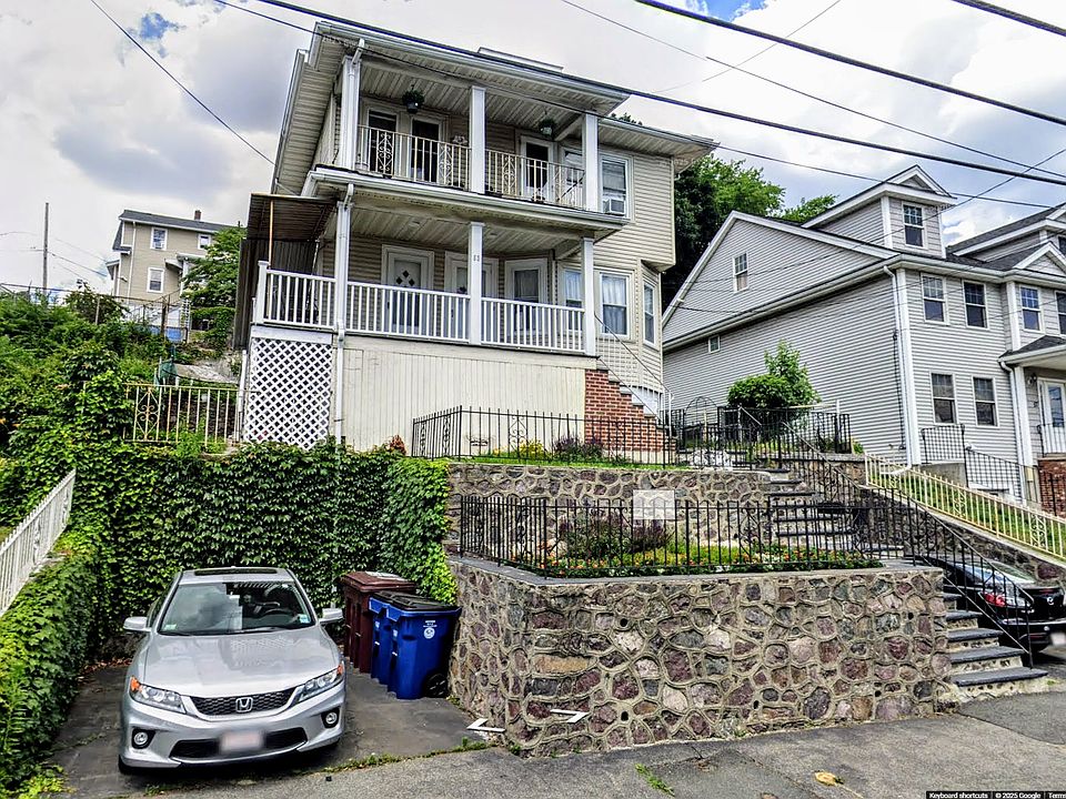 Unit 1 is the first floor & basement. 2 car ports.